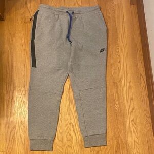 Nike tech Gray Joggers with Black Side Stripe and Blue Drawstring